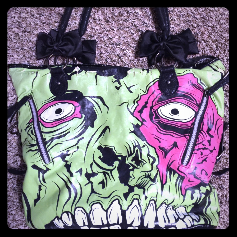 Little loved iron fist zombie purse